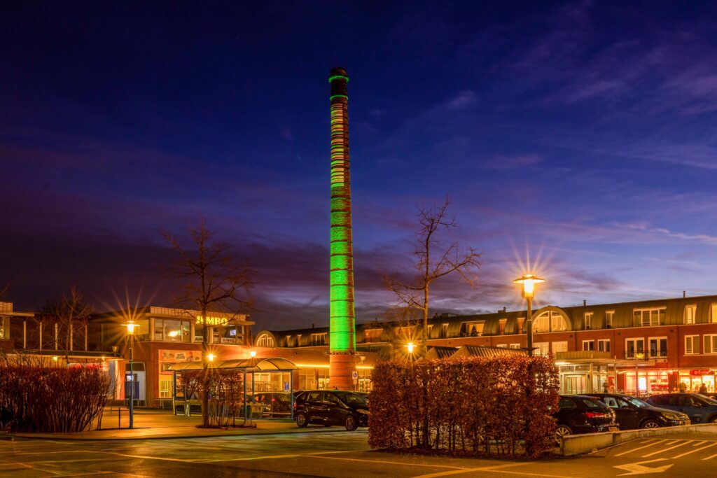 Pharos Architectural Controls and LRS Solutions transform a historic chimney in Oirschot, Netherlands, into a dynamic night-time landmark with flexible RGBW lighting control and event-ready scenes.